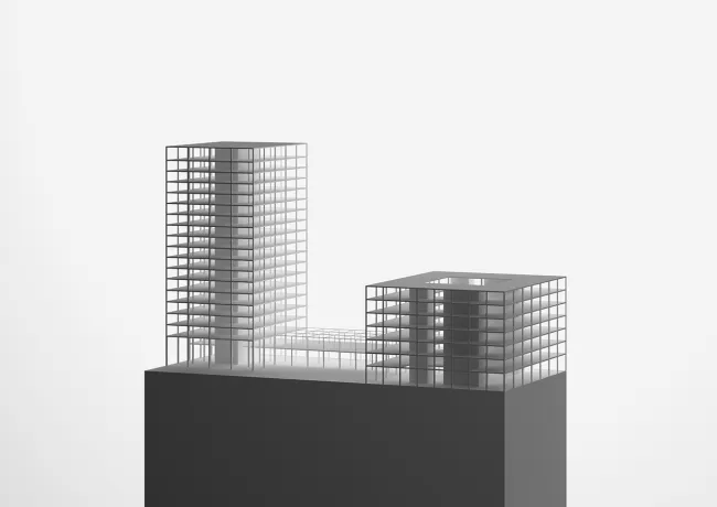 Strukturmodel
Die Geb&auml;udestruktur besteht aus einem Stahlbetonskelettbau. Beim Hochhaus sowie auch beim Gewerbehaus sind sind die St&uuml;tzen so angeordnet, dass effiziente Spannweiten entstehen (Gewerbehaus bis zu 9.4m). Die Aussteifung des Geb&auml;udes erfolgt &uuml;ber die Kernw&auml;nde (Hochaus) oder Kernbereich (Gewerbehaus). 
Das entworfene Tragwerkskonzept &uuml;bernimmt die r&auml;umlichen und architektonischen Vorgaben und erm&ouml;glicht ein effizientes Tragsystem, welches flexible Nutzung erlaubt.Der Bau wird generell in Stahlbeton mit CO2 bindendem Recyclingbeton angedacht.